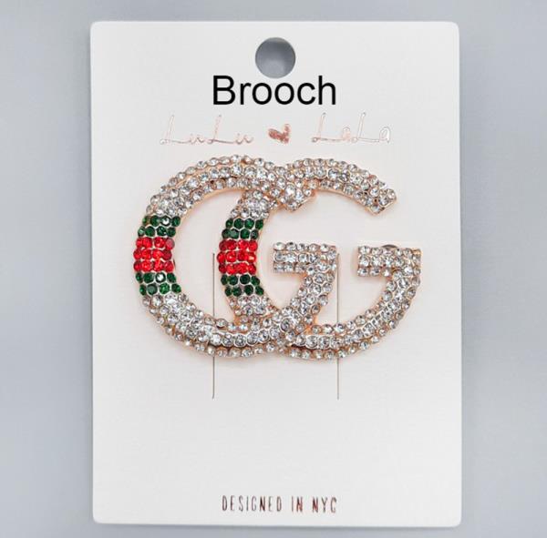 RHINESTONE CC BROOCH