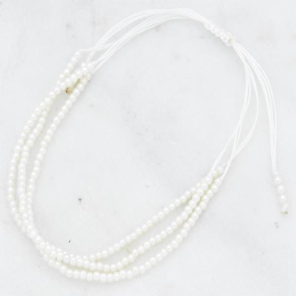 PEARL COLOR THREAD ADJUST BRACELET