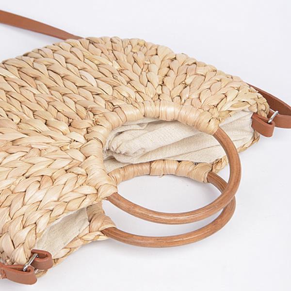 TWIST KNOTTED HANDLED CLUTCH BAG.