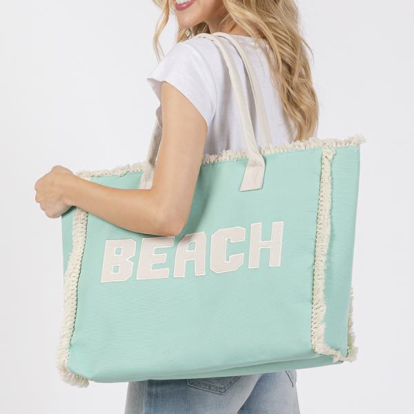 EMBROIDERED BEACH LETTER FRINGE TOTE BAG