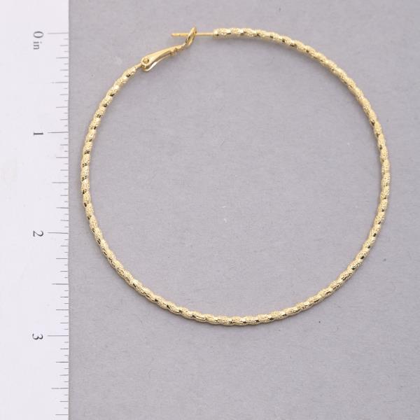 SODAJO TEXTURED GOLD DIPPED HOOP EARRING