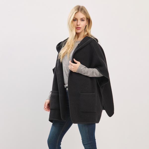 HOODED PONCHO WITH TRIM AND FRONT POCKETS.