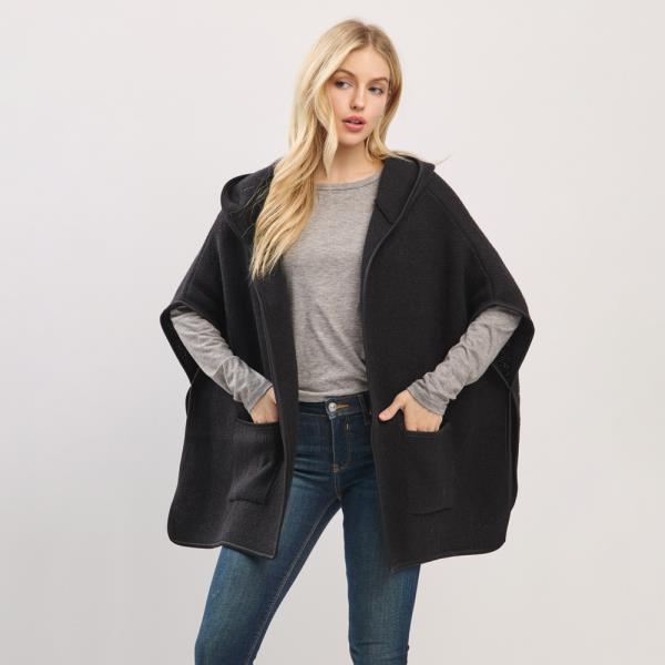 HOODED PONCHO WITH TRIM AND FRONT POCKETS.