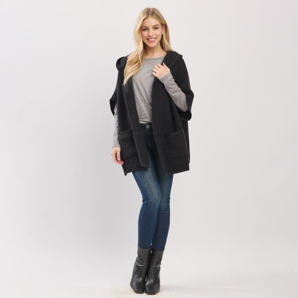 HOODED PONCHO WITH TRIM AND FRONT POCKETS.