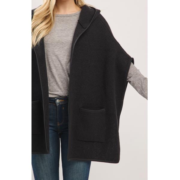 HOODED PONCHO WITH TRIM AND FRONT POCKETS.