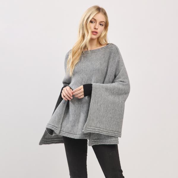 SOLID KNIT PONCHO WITH WIDE SLEEVES AND CLEAN EDGES