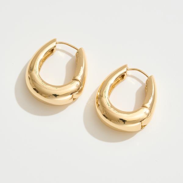 14K GOLD WHITE GOLD DIPPED SCULPTURAL HUGGIE HOOP EARRING