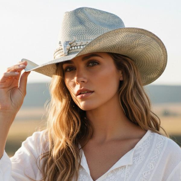 HANDMADE VINTAGE COWBOY HAT WITH SILVER BULL HEAD AND MULTIPLE BANDS.