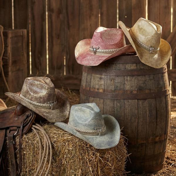 HANDMADE VINTAGE COWBOY HAT WITH SILVER BULL HEAD AND MULTIPLE BANDS.