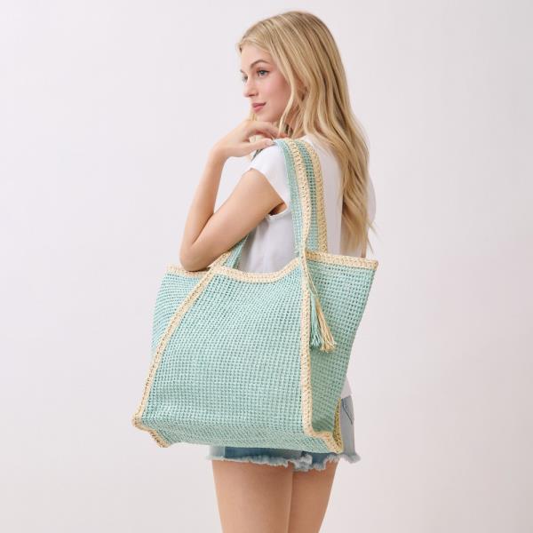 TWO TONE WOVEN STRAW TOTE BAG WITH TASSEL