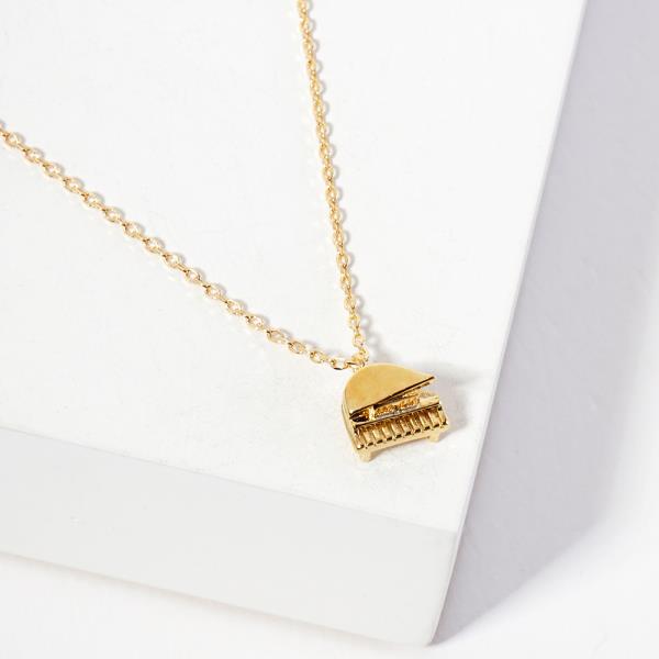 18K GOLD RHODIUM WHITE AND BLACK PIANO PENDANT NECKLACE