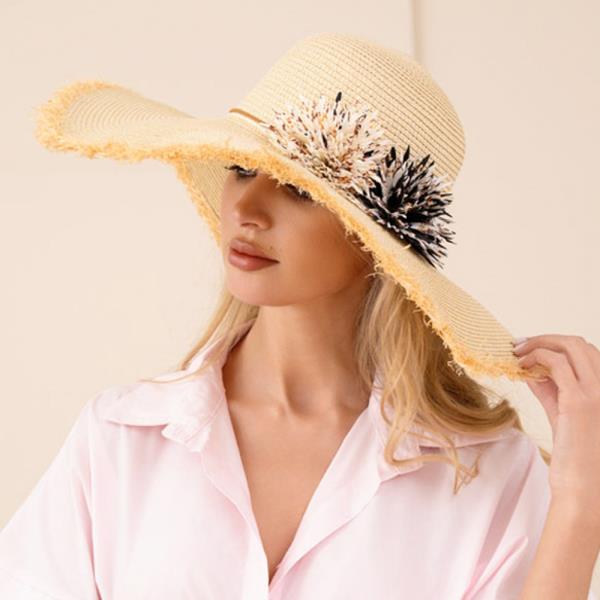 PAPER STRAW FLOPPY SUN HAT WITH WIDE CURVED BRIM AND FRAYED EDGE FINISH ACCENTED WITH FLORAL FEATHER TRIM DETAIL