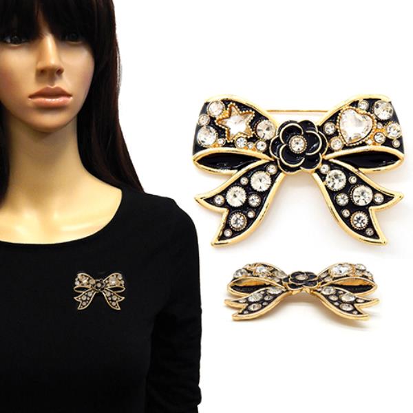 BOW BROOCH DECORATED, SPARKLING CRYSTALS, AND A CENTRAL FLOWER DETAIL