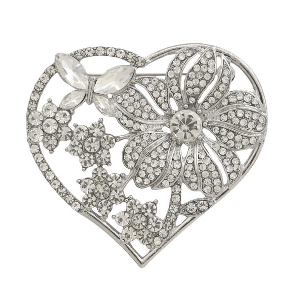 FEATURING AN ENAMELED PINK FLOWER AND BUTTERFLY A HEART BROOCH