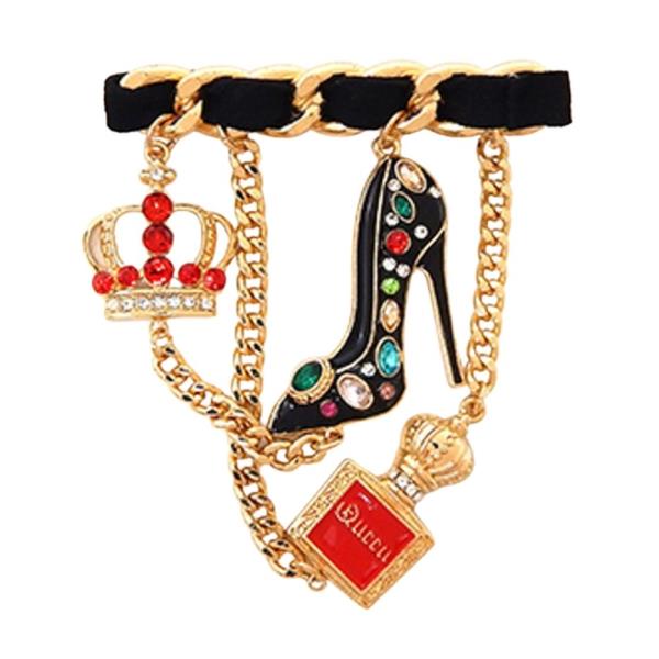 BAR BROOCH FEATURING DANGLING CHARMS OF A HIGH-HEEL SHOE, A CROWN