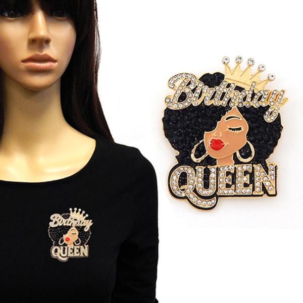 ENAMEL BROOCH FEATURING A BLACK WOMAN WITH AN AFRO, A CROWN, AND THE WORDS "BIRTHDAY QUEEN" IN CRYSTAL LETTERING