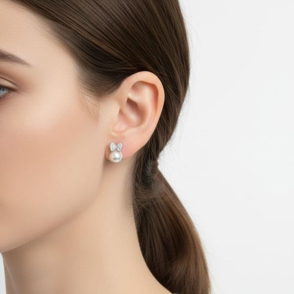 14K GOLD WHITE GOLD DIPPED CZ BOW PEARL STUDS